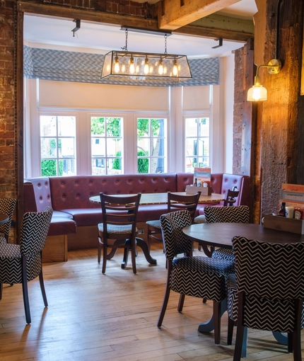 An image of the interior restaurant and seating area at The Guild.