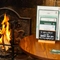 A roaring fire in a fireplace at The Red Lion, Adderbury.