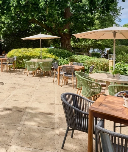 The exterior beer garden and seating area at the Queens Head.