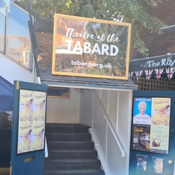 The exterior seating area and theatre entrance at The Tabard in Chiswick.