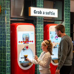 Customers using the self serve softie machine at HighTales.