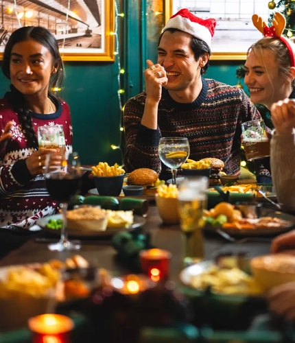 Friends enjoying a festive meal together