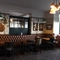 Interior dining area of a pub.