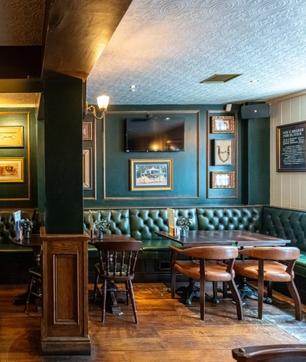 Internal seating area in a pub restaurant