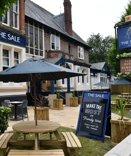 A beer garden outside of a pub