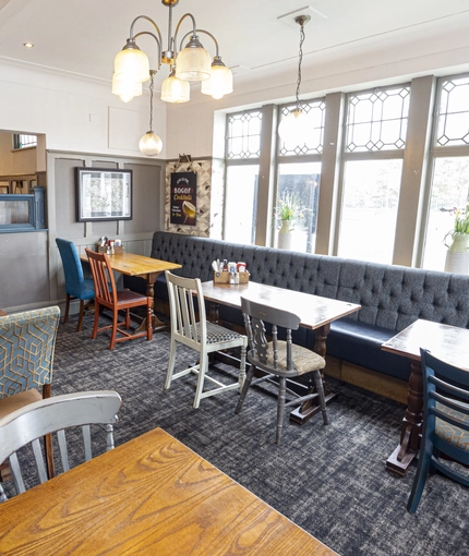 Interior dining area of a pub.