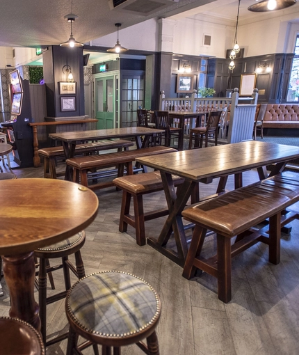 Internal seating area with wooden benches of soft seating area