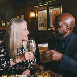 Couples enjoying a valentines meal at a Greene King Heritage vanue.