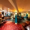 Internal seating area in a pub restaurant