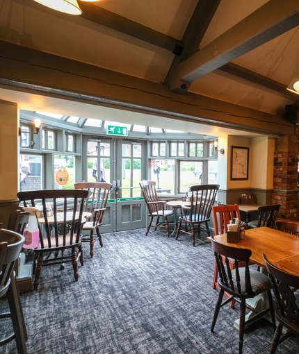 Interior dining area of a pub.