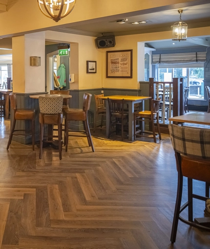 Interior dining area of a pub.