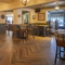 Interior dining area of a pub.