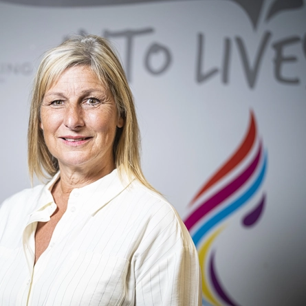 An image of Karen Howell smiling at the camera.