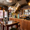 Internal bar area and seating area in a pub