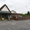 exterior facade and car park of a pub