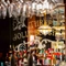 The interior bar area focusing on a mirror that says 'Three Jolly Butchers' and has spirits all lining the bottom of it at the Three Jolly Butchers.