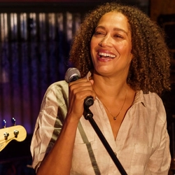 An interior shot of a person singing during the Q3 Live Music Event at one of the Greene King Pubs.