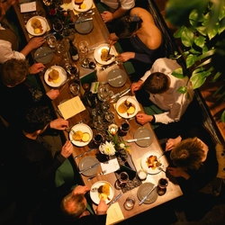 A birds eye view of people enjoying food in the restaurant area at the Ubiquitous Chip in Glasgow.