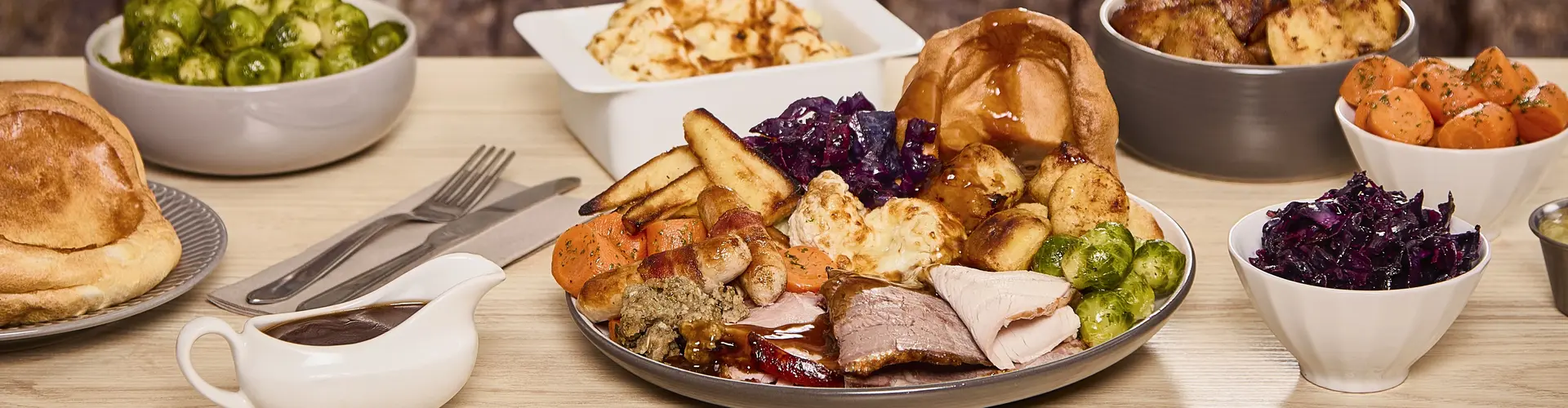 A selection of carvery items on a table with a meal
