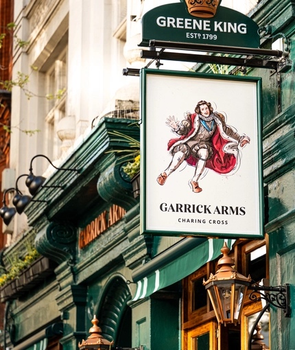 The exterior facade and signage of the Garrick Arms in Charing Cross.