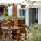 A table with an umbrella in the beer garden of the Grapes.