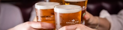 Pints of Greene King beers
