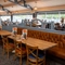 The interior restaurant seating area with TV, at The Stanley Ferry.