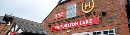 The exterior signage for the Furzton Lake.