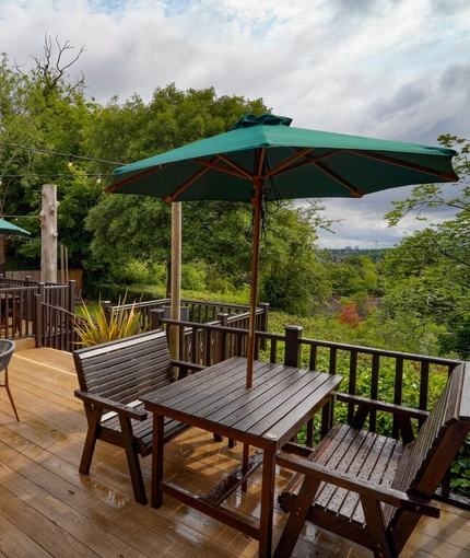 The exterior beer garden seating area at The Two Greens.